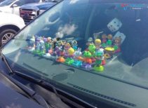 Tượng Phong Thủy Trên Taplo Xe Ô Tô: Lợi Ích Ít Nhưng Rủi Ro Nhiều