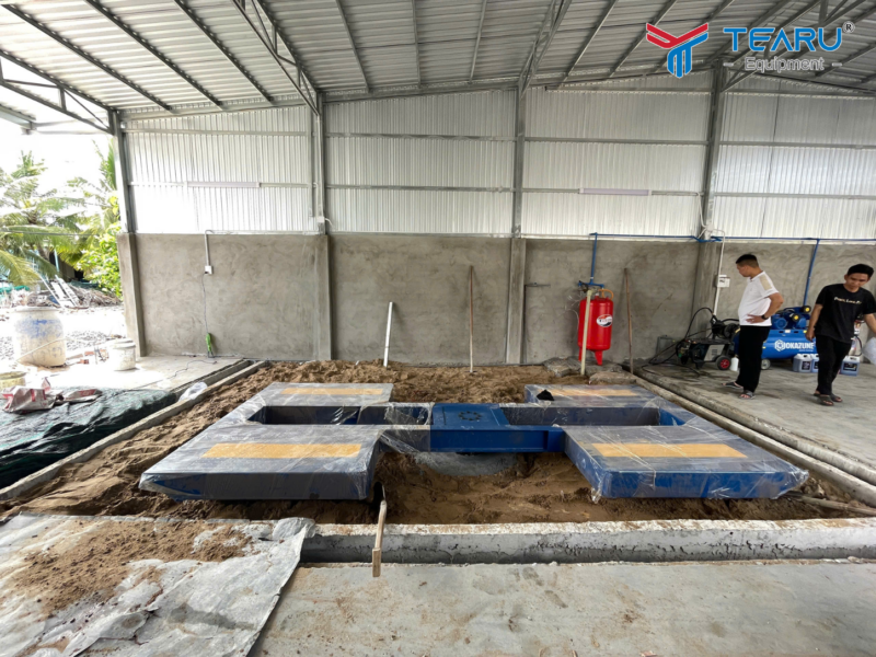 Hình ảnh thực tế quá trình lắp đặt cầu nâng rửa xe tại tiệm.